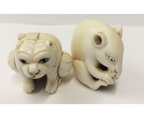 Carved Ivory Netsuke Rat nibbling his tail, signed to foot & Crouching Cat signed to foot (2) 