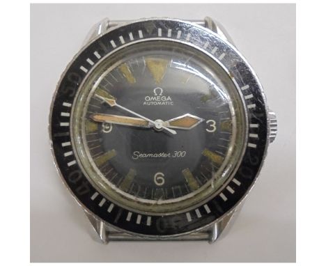 Omega Seamaster 300 Automatic Wristwatch with black dial, painted compass numbers, white sweep seconds hand, rotating outer d