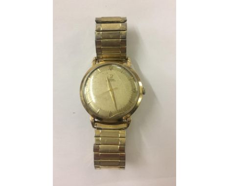 9ct Gold Omega Automatic with Arab compass numerals & baton markers, sweep second hand, gilt strap 
