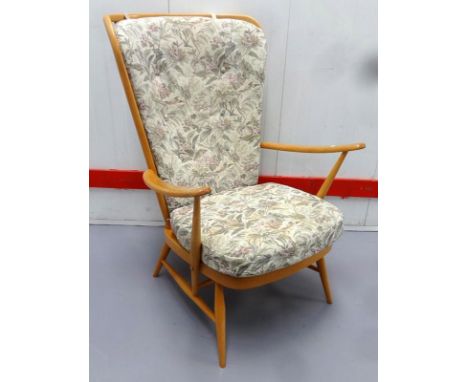 High Backed Ercol Open Armchair with high stick back & beige cushions 