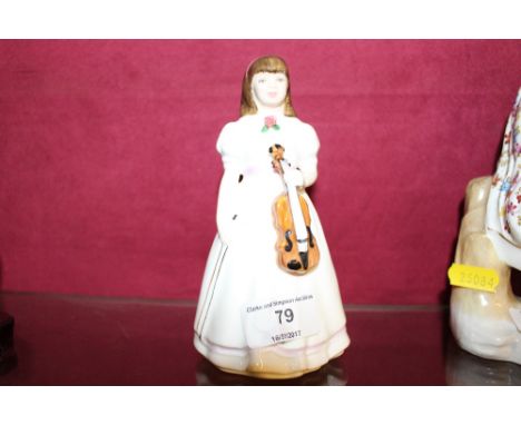 A Royal Doulton figurine 'First Performance'