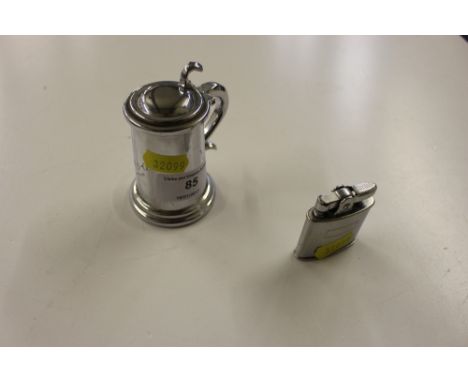 A novelty Dunhill lighter in the form of a tankard and a Ronson lighter 