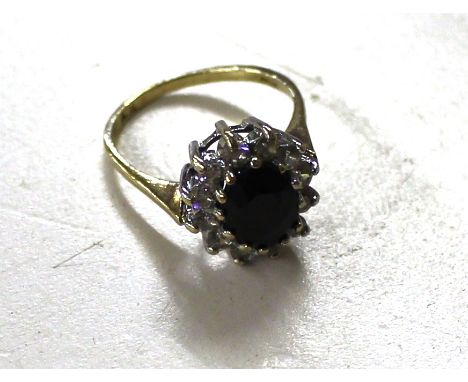 A 9ct gold sapphire set ring