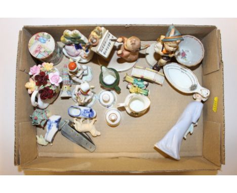 A tray of various china ornaments to include Goebel;  Chinese Canton pot and cover; a miniature Staffordshire flat back figur