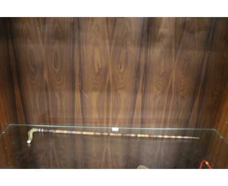 A VINTAGE INLAID HORN HANDLED WALKING CANE