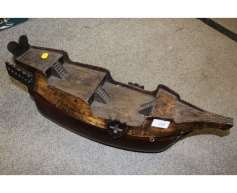 A VINTAGE WOODEN BOAT