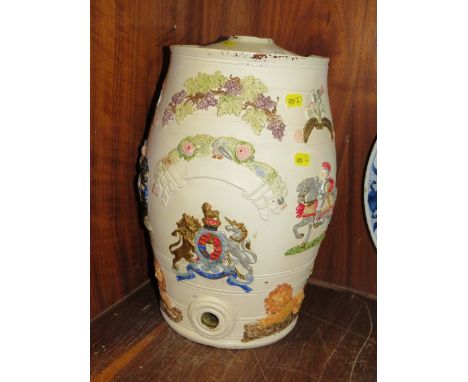 A VINTAGE CERAMIC BARREL WITH IMAGES IN RELIEF, CHIP TO RIM