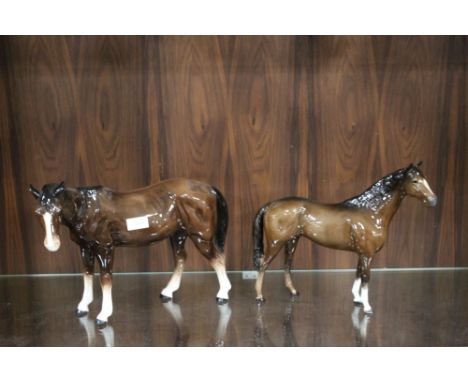 A LARGE MELBA WARE RACE HORSE FIGURE TOGETHER WITH A LARGE BESWICK EXAMPLE 