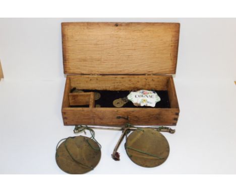 A SET OF ANTIQUE SCALES AND WEIGHTS, WINE LABEL, AND MINIATURE PADLOCK