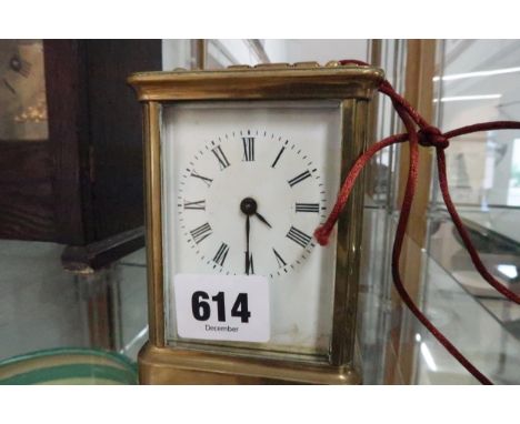 An early 20th century brass cased carriage clock, with Roman numerals to the chapter ring.