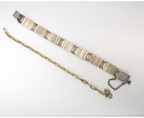 A 14ct gold oval link bracelet with 'G' charm, likely 9ct, total weight 5.0g, 19.5cm long, and a silver panelled bracelet wit