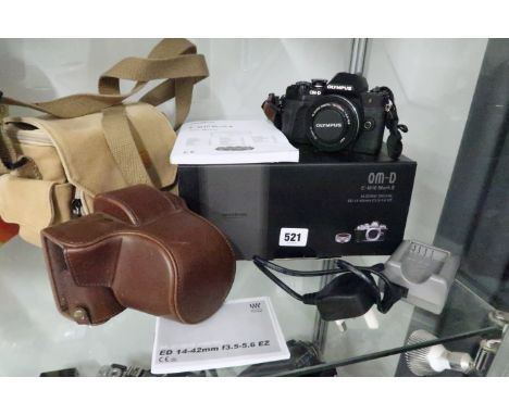 An Olympus Digital E-M10 Mark III camera complete with original box, instructions 14-42mm lens