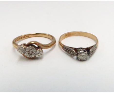 A vintage 18ct gold and diamond solitaire ring, the stone of approximately 0.06ct, ring size L, 1.8g and a 9ct gold and diamo