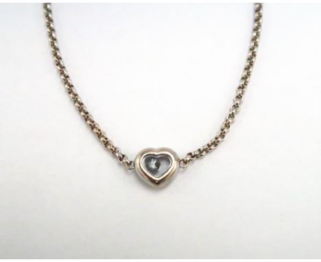 A Chopard 18ct white gold floating diamond heart bracelet, with heart shaped pendant on chain - Length approx 18cm - weight a