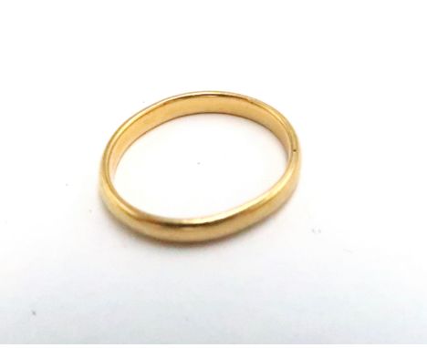 A 22ct gold wedding band, size J/K,  3.1g.