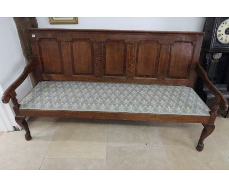 A Georgian oak hall bench with five panel back - Width 188cm x Height 105cm