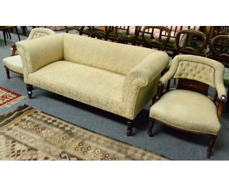 Mahogany framed Victorian sofa together with a two similarly upholstered button back open armchairs 