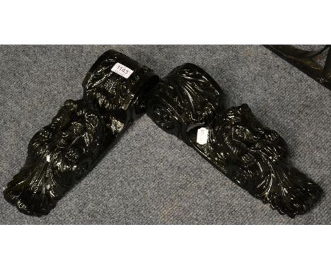 A pair of terracotta corbels stamped J Armitage and Son, Manchester and Sheffield. Manufactured between 1874 - 1878, with lio