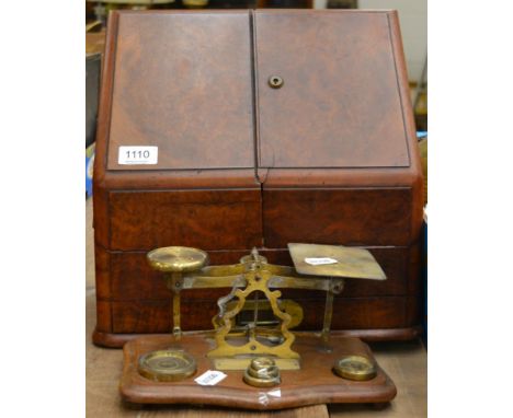A late Victorian burr walnut stationery casket, together with a pair of postal scales