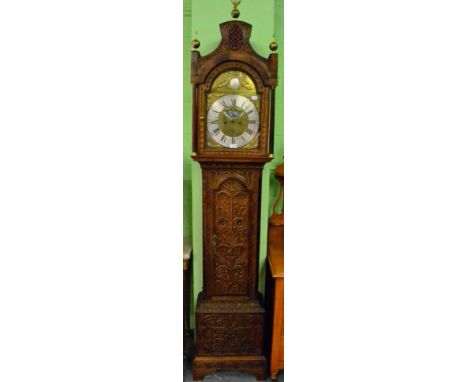 A carved oak eight day longcase clock, dial bearing a later inscription John Pattison, Halifax 