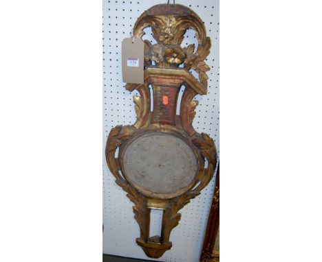 A 19th century French carved giltwood barometer (lacking dials)