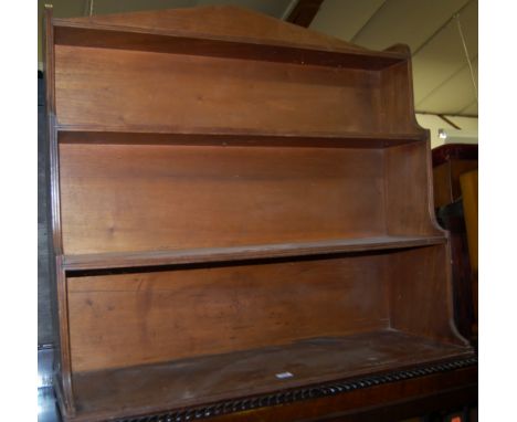 A 19th century mahogany waterfall hanging wall shelf, width 91cm