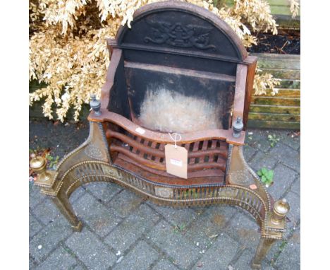 An Adam style cast iron and brass fire basket, width 68cm Condition:Break to the base of the grate.Break to tile across the b