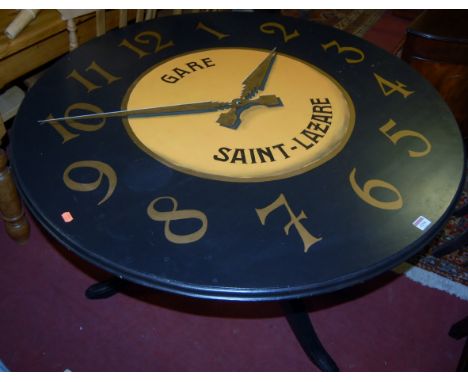 A painted pine circular pedestal kitchen table, the top painted as a station clock dial for Gare Saint-Lazare, dia. 106cm