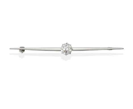 the round brilliant cut diamond in a white claw setting, to a plain polished tapering bar, estimated diamond weight 0.85 cara