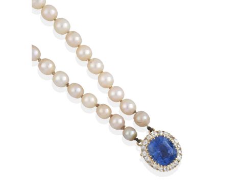 the 48:51 graduated cultured pearls knotted to an oval clasp comprising of a cushion cut sapphire within a border of old cut 