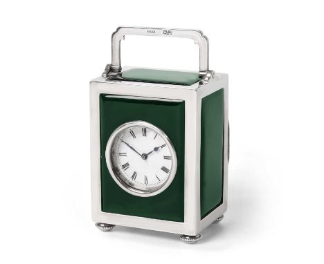 in the form of a carriage clock, each side with a green enamel panel over an engine-turned ground, on four fluted compressed 