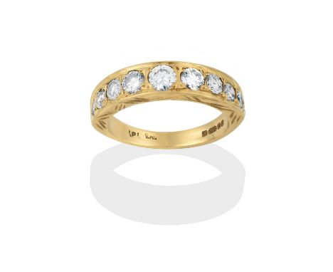 the graduated round brilliant cut diamonds in yellow square settings, to a plain polished shank, total estimated diamond weig
