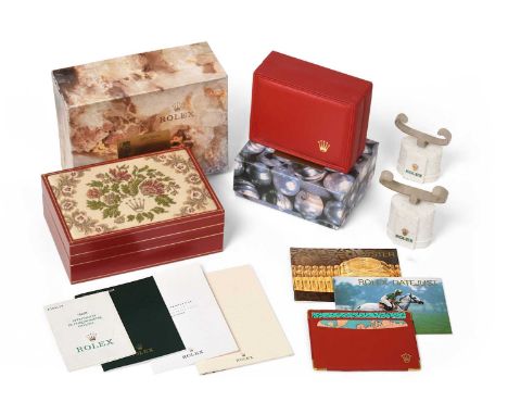 comprising of a Rolex red embroidered tapestry box and outer box, three booklets, card holder, calendar card for 1998/1999, a