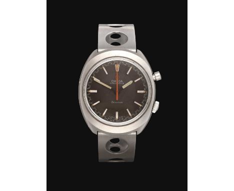 manual wound lever movement, grey coloured dial with baton markers, outer fifth of seconds track, tonneau shaped case with a 