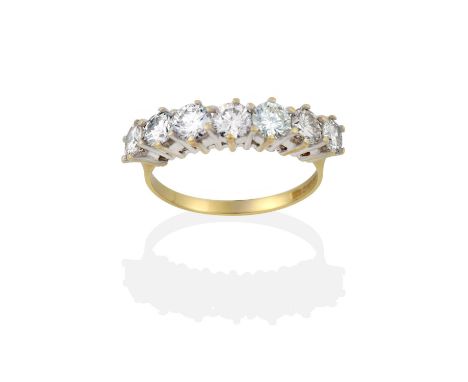 the round brilliant cut diamonds in white claw settings, to a yellow tapered shoulder plain polished shank, total estimated d