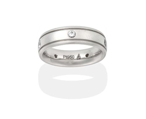 the plain polished band inset with five round brilliant cut diamonds, total estimated diamond weight 0.25 carat approximately