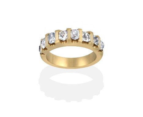 the eight old cut diamonds in yellow bar settings, to a plain polished shank, total estimated diamond weight 1.20 carat appro