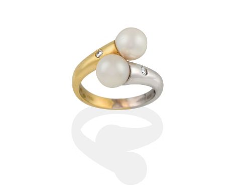 the bi-coloured twist band inset with two round brilliant cut diamonds and terminating to cultured pearls, total estimated di