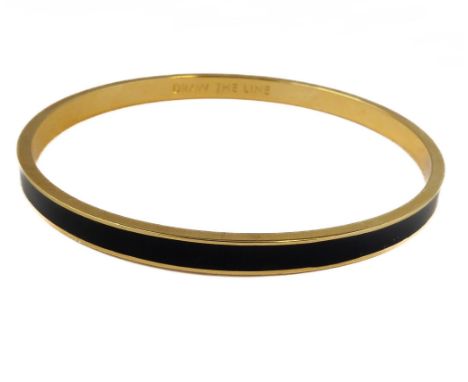 A Kate Spade (New York) 'Draw the Line' gold plated and black enamel bangle (internal diameter 6.5cm)