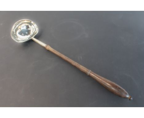 A George II silver punch or toddy ladle, maker probably Thomas Rush, London 1733, with shaped ovoid bowl and turned wooden ha