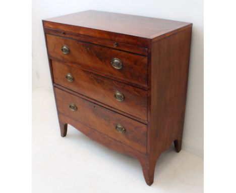 A late 18th/early 19th century George III period mahogany and cross-banded caddy-topped chest; brushing slide above three ful