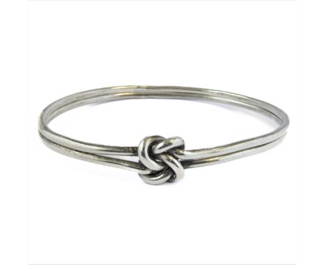 A heavy double-hallmarked silver bangle co-joined with a central Celtic style knot (fully hallmarked, boxed)