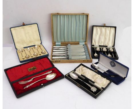 Four cased sets of silver flatware: including an Edwardian christening knife and fork set, Nathan &amp; Hayes, Birmingham 190