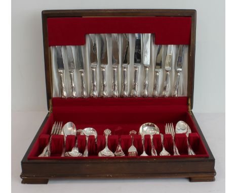 A mahogany-cased six-place silver-plated service comprising table knives and forks; dessert knives, forks and spoons; fish-ea