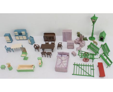 The complete 23-piece Dinky Toys 'Dolly Varden' doll's house furniture set and 11 other pieces: Kitchen (5 pieces - 103 a - e