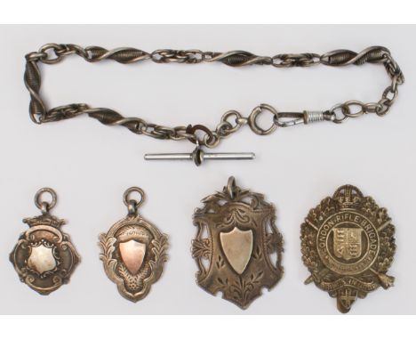 A mixed lot of five: three hallmarked silver sports medallions, one engraved  B.T.T.L. CHAMPIONS 1936-37; a London Rifle Brig