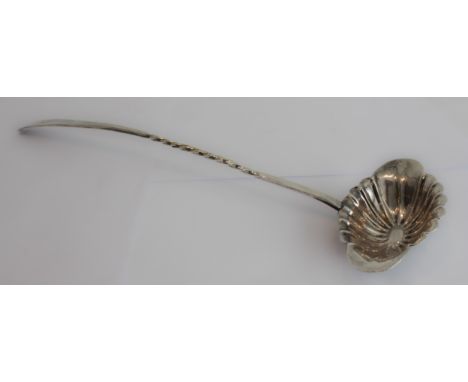 A large 19th century silver-plated Russian ladle, wrythen stem leading to a shell-shaped pourer with side pouring spout, mark