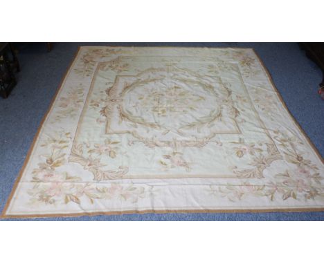 A French&nbsp;Aubusson tapestry: beige and light green ground with a beige border, decorated with flowering pink rose branche
