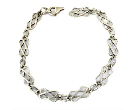 A silver bracelet modelled in Celtic style with open-work pierced co-joined figure of 8s (19cm, boxed)