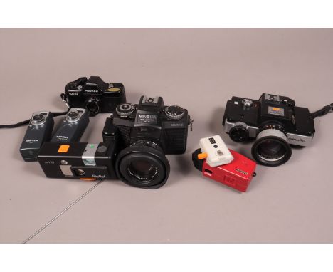 Minolta and Pentax 110 Cartridge Cameras, comprising a Minolta 110 Zoom SLR Mark I, a Minolta 110 Zoom SLR Mark II, both shut